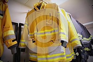 Firefighter suit and equipment ready for operation, Fire fighter room for store equipment, Protection equipment of fire fighter