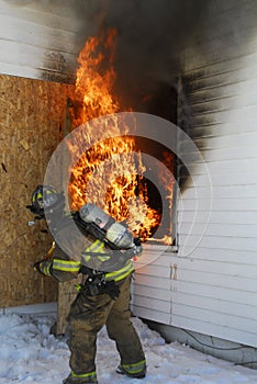 Firefighter tackling blaze