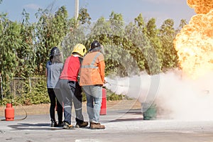 Firefighter training,Instructor training how to use a fire extinguisher for fighting fire