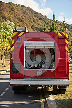 Firefighter truck with fireman`s cane after a fire, outdoors