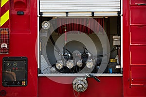 Firefighter truck with fireman`s cane after a fire, outdoors