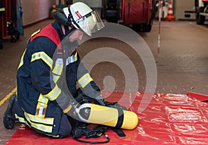 Firefighter used a oxygen cylinder