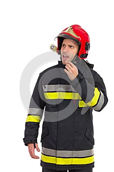 Firefighter using walkie-talkie