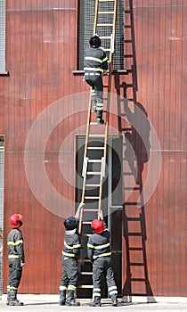 firefighters in action during the exercise in the fire station w