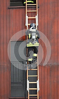 firefighters in action in the fire station with self-contained b