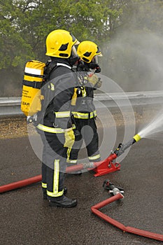 Firefighters cooling spray.