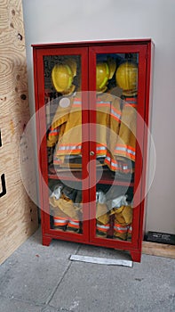 Firefighters equipment in a cabinet