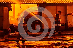 Firefighters extinguish a fire