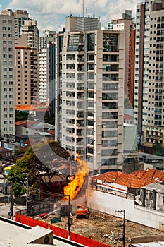 Firefighters fighting a fire in a brazilian street