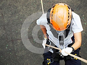 Firefighters are rappelling and climbing ropes