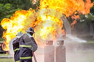 Firefighters are training for fighting with fire from gas.