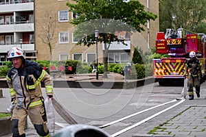 Firefighters with truck, Sweden