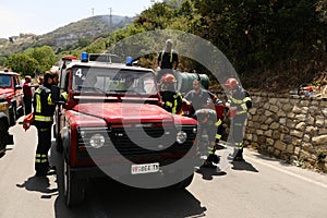 Firefighters on work on forest fireblaze