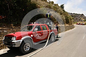 Firefighters on work on forest fireblaze