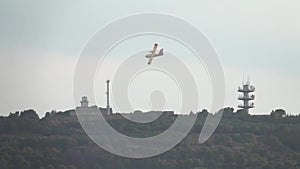 Firefighting amphibious aircraft dumps water to extinguish the fire