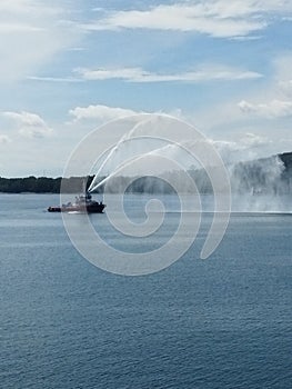 firefighting training with a boat in extinguishing fires in the middle of the sea
