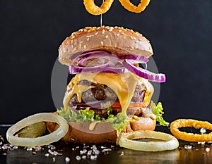 Firefly A deconstructed gourmet burger caught in a freeze-frame, with golden cheese dripping