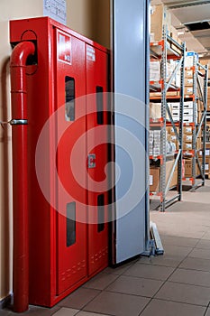 Firehose in warehouse. Fire safety. fire and safety equipment photo