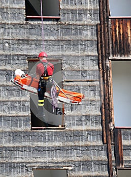 Fireman during an exercise carries the stretcher