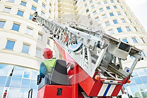 Fireman during extinguish a fire