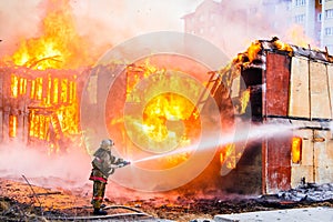 Fireman extinguishes a fire