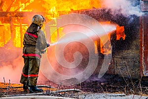 Fireman extinguishes a fire