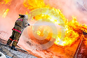 Fireman extinguishes a fire