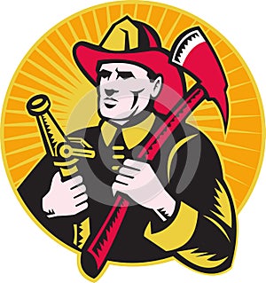 Fireman firefighter holding ax fire hose