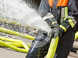 Fireman with a firehose