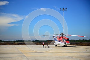 Fireman is guarding for helicopter before start up engine