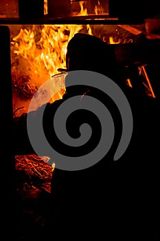 Fireman lighting the bonfire