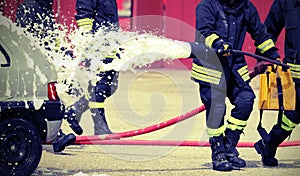 fireman with respirator with oxygen cylinders during the fire ex