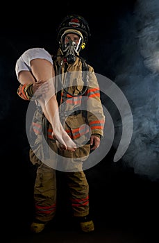 Fireman saving a victim photo