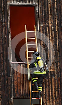 Fireman on the scale during the fire drill