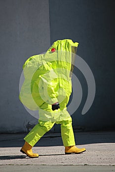 Fireman with a suit for protection from the risk of biological a