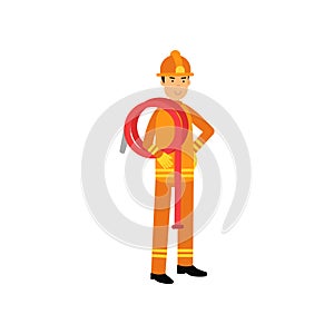 Fireman in uniform and protective helmet, holding roll of water hose on his shoulder