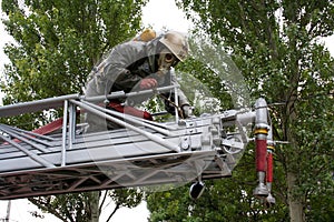 Fireman wearing a gas mask on the stairs