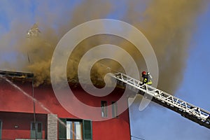 Firemans on a roof fire