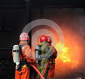 Firemen fighting the fire