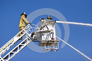 Firemen on ladder