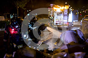 The firemen work in a night fire. Madrid Spain.
