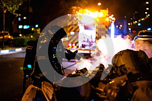 The firemen work in a night fire. Madrid Spain.