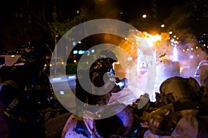 The firemen work in a night fire. Madrid Spain.