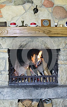 Fireplace with burning firewoods