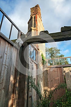 Fireplace chimney at the abandoned wrecked house