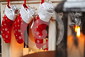 Fireplace with Christmas stockings in room interior