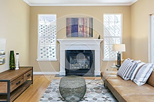 Fireplace embedded in living room.