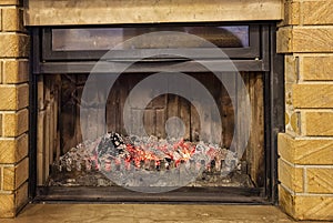 fireplace with glowing charcoals