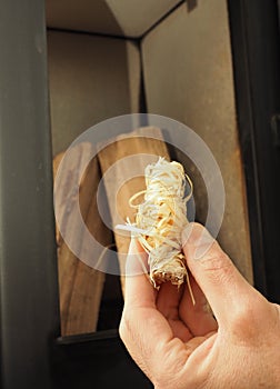 Fireplace igniter in a male hand