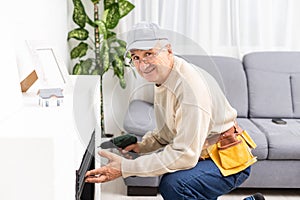 Fireplace installing in white brick wall.